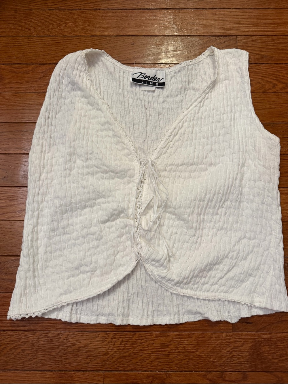 White Textured Tie-Front Sleeveless Blouse
